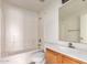 Bathroom features a standard tub-shower combo, toilet and single sink vanity at 1608 S 82Nd Dr, Phoenix, AZ 85043