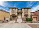 Charming two-story home with attached garage and well-maintained front yard at 1733 N 77Th Dr, Phoenix, AZ 85035
