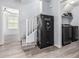 Hallway featuring a safe and the laundry room at 1733 N 77Th Dr, Phoenix, AZ 85035