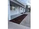 Charming covered front porch with painted brick and new landscaping at 1813 E Boise St, Mesa, AZ 85203
