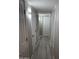 Hallway with wood-look flooring and updated doors at 1813 E Boise St, Mesa, AZ 85203