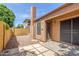 Backyard patio with stone landscaping and private block wall at 1836 N Stapley Dr # 191, Mesa, AZ 85203