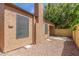 Backyard of home with block wall and stone landscaping at 1836 N Stapley Dr # 191, Mesa, AZ 85203