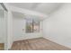 This room features neutral carpet, white walls and a window that provides plenty of natural light at 1836 N Stapley Dr # 191, Mesa, AZ 85203