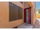 Close up of the front door with security screen and stone walkway at 1836 N Stapley Dr # 191, Mesa, AZ 85203