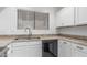 Bright kitchen features black dishwasher, sink, and granite countertops at 1836 N Stapley Dr # 191, Mesa, AZ 85203