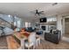 Inviting living room boasts a fireplace, built-in shelving, and comfortable seating at 20557 W Lost Creek Dr, Buckeye, AZ 85396