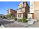 Attractive two-story home with manicured landscaping, stone details, and a welcoming front entrance at 2111 N 77Th Gln, Phoenix, AZ 85035