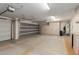 Huge garage with storage cabinets and a work bench, with a three car capacity at 2189 E Ranch Ct, Gilbert, AZ 85296