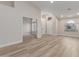 Bright living room boasting wood-look floors, arched doorways, and natural light at 2189 E Ranch Ct, Gilbert, AZ 85296