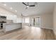 Open-concept living space combining the kitchen, dining and living areas at 2189 E Ranch Ct, Gilbert, AZ 85296