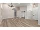 Spacious, light-filled living room featuring vaulted ceilings and wood-look floors at 2189 E Ranch Ct, Gilbert, AZ 85296