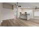 Inviting open-concept living room featuring vaulted ceilings and wood-look floors at 2189 E Ranch Ct, Gilbert, AZ 85296