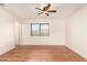 Spacious bedroom featuring a ceiling fan and window at 22615 N 31St Dr, Phoenix, AZ 85027