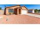 Charming single-story home with desert landscaping and attached two-car garage at 22615 N 31St Dr, Phoenix, AZ 85027