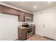 Kitchen featuring granite countertops and stainless steel appliances at 22615 N 31St Dr, Phoenix, AZ 85027
