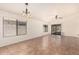 Open living area with tile floors, bright light and view to the exterior at 22615 N 31St Dr, Phoenix, AZ 85027