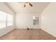 Unfurnished room with tile flooring, a ceiling fan and a window at 22615 N 31St Dr, Phoenix, AZ 85027