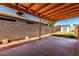 Covered patio with a view of the backyard and storage shed at 22615 N 31St Dr, Phoenix, AZ 85027