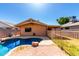 Backyard pool with sunny brick patio offers a refreshing escape and enhances outdoor living at 22615 N 31St Dr, Phoenix, AZ 85027