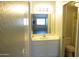 Bathroom featuring a white vanity with a mirror and a toilet at 2301 E University Dr # 334, Mesa, AZ 85213