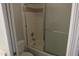 Bathroom featuring a toilet and a shower and bathtub combo with glass sliding doors at 2301 E University Dr # 334, Mesa, AZ 85213