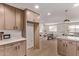 Kitchen with modern cabinetry, stainless appliances, quartz counters and an open layout at 2339 W Ponderosa Ln, Phoenix, AZ 85023