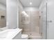 Modern bathroom with tiled shower, glass door, and neutral color palette at 2511 W Queen Creek Rd # 116, Chandler, AZ 85248