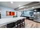This community kitchen is equipped with modern appliances and plenty of counter space at 2511 W Queen Creek Rd # 116, Chandler, AZ 85248