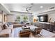 Comfortable community lounge with stylish furnishings, large windows and a large-screen TV at 2511 W Queen Creek Rd # 116, Chandler, AZ 85248
