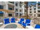 Outdoor seating area includes a fire pit, perfect for socializing and relaxing at 2511 W Queen Creek Rd # 116, Chandler, AZ 85248