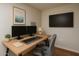 Bright office featuring dual monitors, wooden desk, and modern decor at 2511 W Queen Creek Rd # 116, Chandler, AZ 85248
