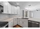 Well-equipped kitchen featuring stainless steel appliances, modern cabinetry, and a sink at 2511 W Queen Creek Rd # 116, Chandler, AZ 85248