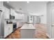 Modern kitchen featuring white cabinets, stainless steel appliances, and a spacious island at 2511 W Queen Creek Rd # 116, Chandler, AZ 85248