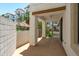 Inviting covered patio with seating and views of the complex's courtyard at 2511 W Queen Creek Rd # 116, Chandler, AZ 85248