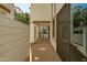 Covered patio with tile flooring and views of lush landscaping at 2511 W Queen Creek Rd # 116, Chandler, AZ 85248