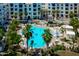 Relaxing pool area surrounded by palm trees, lounge chairs, and pristine landscaping at 2511 W Queen Creek Rd # 116, Chandler, AZ 85248