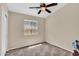 Neutral bedroom with carpet, ceiling fan, and window at 2738 E Silversmith Trl, San Tan Valley, AZ 85143