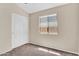 Cozy bedroom featuring natural light from a window and a large closet at 2738 E Silversmith Trl, San Tan Valley, AZ 85143