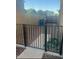 Backyard featuring a gated side yard with brick pavers, perfect for pets or storage at 29474 W Columbus Ave, Buckeye, AZ 85396