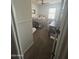 Well-lit bedroom featuring plush carpeting, a cozy bed, and a practical desk setup at 29474 W Columbus Ave, Buckeye, AZ 85396