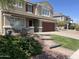 Charming two-story home with manicured landscaping and inviting curb appeal at 29474 W Columbus Ave, Buckeye, AZ 85396