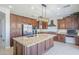 Gourmet kitchen with stainless steel appliances, granite countertops, and ample cabinet space at 29474 W Columbus Ave, Buckeye, AZ 85396