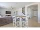 Casual dining area in an open-concept living space, steps away from stairs and entryway at 29474 W Columbus Ave, Buckeye, AZ 85396