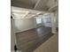 Open concept living room with hardwood floors and contemporary ceiling at 29474 W Columbus Ave, Buckeye, AZ 85396