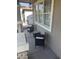 Cozy front porch features seating area and ample natural light at 29474 W Columbus Ave, Buckeye, AZ 85396