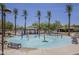 Community splash pad area with various water features, shade structures and lounge chairs at 29474 W Columbus Ave, Buckeye, AZ 85396