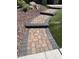 Close up of a paved walkway lined with rocks and artificial grass at 29474 W Columbus Ave, Buckeye, AZ 85396