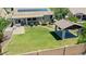 Aerial view of backyard featuring a covered patio, landscaping, and gazebo at 30308 W Whitton Ave, Buckeye, AZ 85396