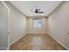 This bedroom boasts recessed lighting, a ceiling fan, and a window at 30308 W Whitton Ave, Buckeye, AZ 85396